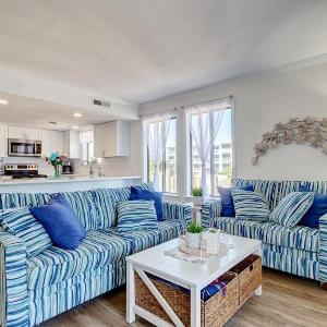 Toes in the Sand by Bryant Real Estate