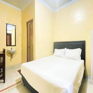 Mas Klimis Guesthouse Pakuwon Mall Mitra RedDoorz