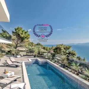 Luxury Villa Happiness with private pool jacuzzi sauna and gym by the beach in Omis