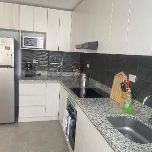 Moderno departamento 2 dormitorios con patio