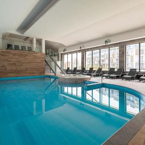 Osiedle Feniks Apartament z Basenem & Sauną i Salą Zabaw by Noclegi Renters