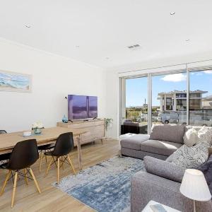 Relax in blissful sun-soaked luxury by the beach