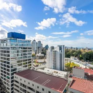 City Stunner with City Views Pool and Gym
