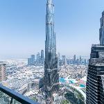 Elegant 4BR High-Rise Overlooking Burj Khalifa & Fountains