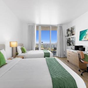 Stylish 2BR High-Rise Retreat w Ocean Views