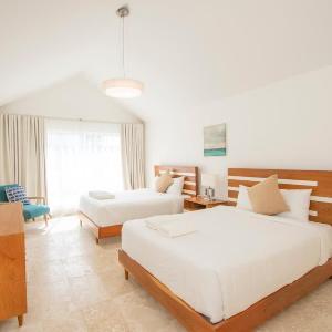 Modern 2BR Caribbean Apt -Pool & Beach Access