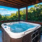Moonstruck - Stone Firepit with a Waterfall Outdoor Hot Tub Game Room + Chalet Village Access Gatlinburg Tennessee