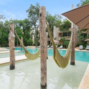 Stylish 1BR Condo with Private Pool & Balcony