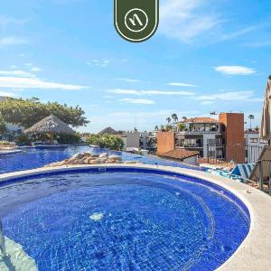 Stylish 2 BR Condo in Romantic Zone - Rooftop Pool