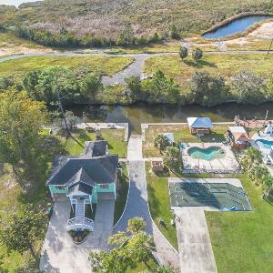 Waterfront Home with Pool by Next Step Property Management