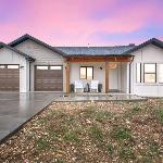 Stunner with Lake Mountain Views and Private Hot Tub