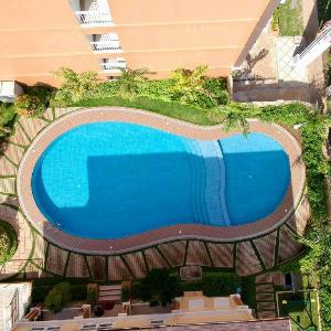 Verdant Condo Studio | Pool | Balcony | Near Airport