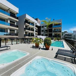 Oásis do Atlântico 402 A – Apartamento amplo em condomínio completo a apenas 5 minutos da Praia de Palmas