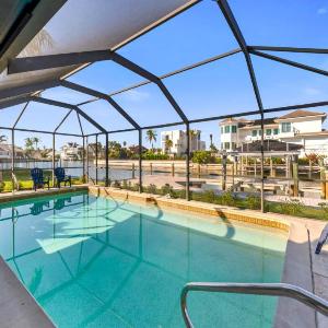 New Listing! Waterfront Escape on canal w/Pool
