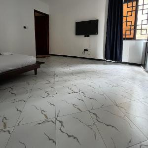 MiniPalais Studio Kisaasi