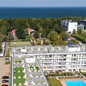 Blue and Beige Apartment in Sianożęty with Seasonal Pool Parking and Balcony by Noclegi Renters
