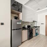 VayK - Chic Studio in Silicon Oasis with Pool View