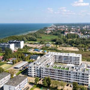 Ku Morzu Nadmorski Apartament w Pobliżu Plaży z Basenem i Parkingiem by Noclegi Renters
