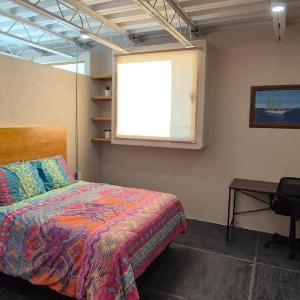 SB 202 Studio en el Malecón