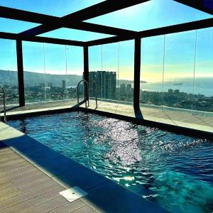 Descansa en Viña estudio con piscina y terraza
