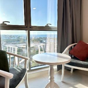 Modern 2BR Oasis - Balcony With Sea View