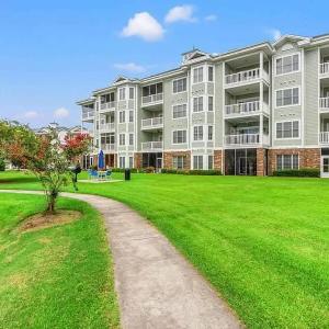 Coastal Comfort 3BR Condo Balcony Elevator