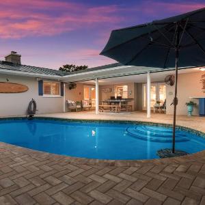 Tropical Tiki - Outdoor Oasis Tiki Hut Pool by Anna Maria Life Vacation Rentals