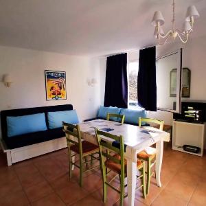 Apartment with pools and garden near the beach