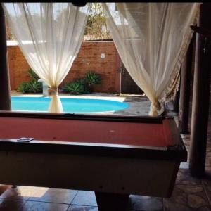 Casa com Piscina