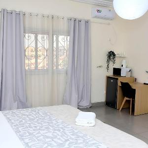 Suite Amina - Spacieuse Wi-Fi & Clim