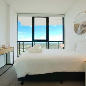 Beautiful City and Sky View 2BR Apt w Pool Gym Sauna