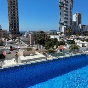 Cerca de la Playa con Alberca en Roof By GPSRenta