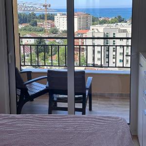Modern Sea & City View Apartment with Parking
