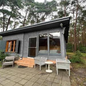 Holiday home with private garden close to the sea