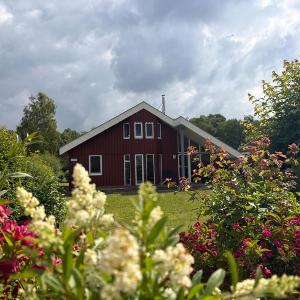 Ferienhaus im skandinavischen Stil mit Garten im Hafendorf Rechlin