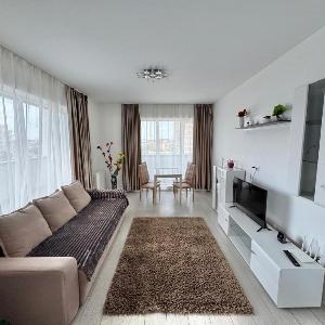 UNITY APARTMENTS Coresi Mall