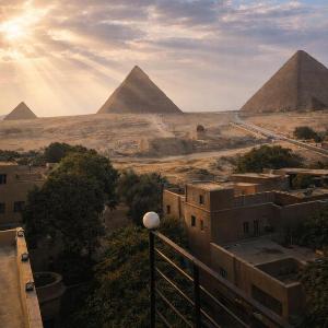 Hathor palace pyramids view