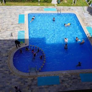 Charming 2-Bedroom Apartment with Pool View and Balcony