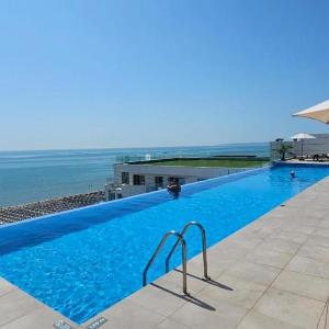 Infinity Roof Top Pool Beach & Spa Resort Apartments