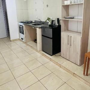 Habitación privada con cocina y baño compartido