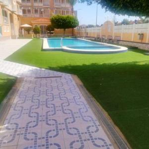 Apartment with 2 bedrooms in Los Alcazares with wonderful city view shared pool terrace 300 m from the beach