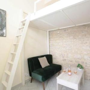 Cosy Nest in The Marais by GuestReady