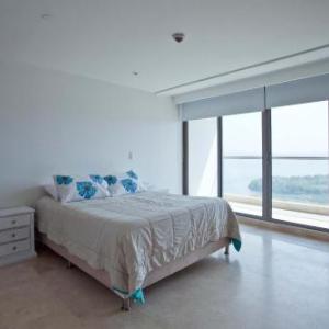 Bello apartamento dentro del Hotel Radisson Ocean Pavillion