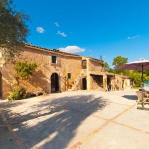 Villa Cas Pomer pool and garden in Costitx