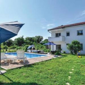 Four-Bedroom Holiday Home in Prolozac Donji