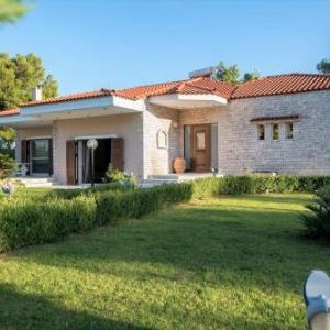 Villa BELLEZZA with a large yard and BBQ.