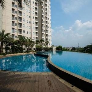 Best Location 1BR Apartment Mustika Golf Residence By Travelio