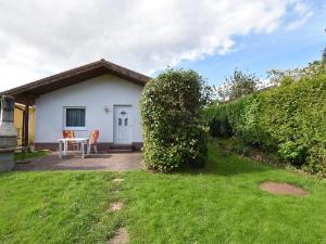 Charming Bungalow with Fenced Garden in Bastorf, Bastorf