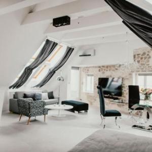 Coco Chanel Boutique Apartment by goodnite cz