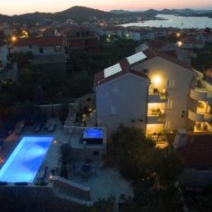 Family-friendly apartments with swimming pool Murter - 16655